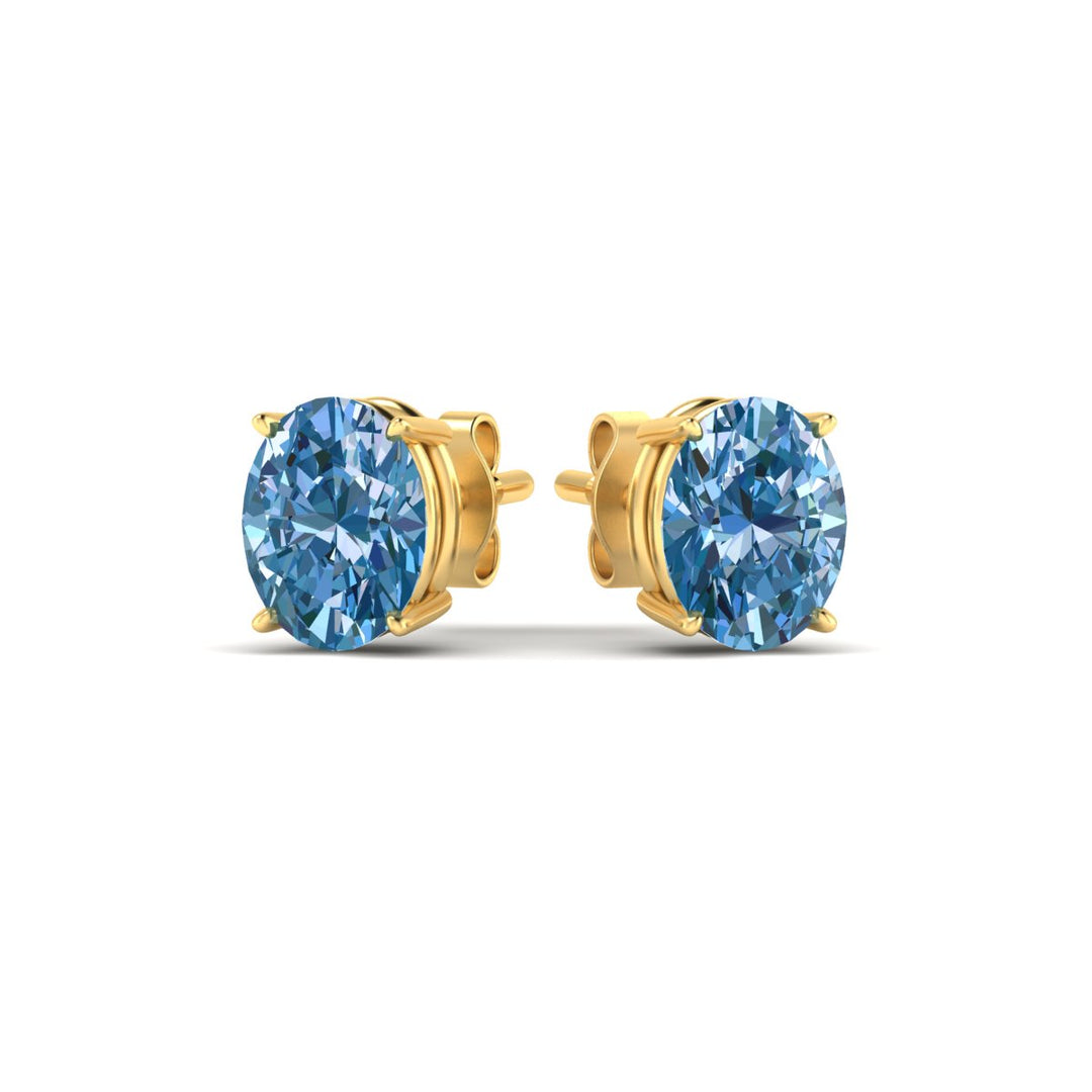 4-carat-oval-cut-vivid-blue-diamond-stud-earrings-in-yellow-gold-fdear10411ovgvblueangle3-4.00ct-nl-yg.jpg