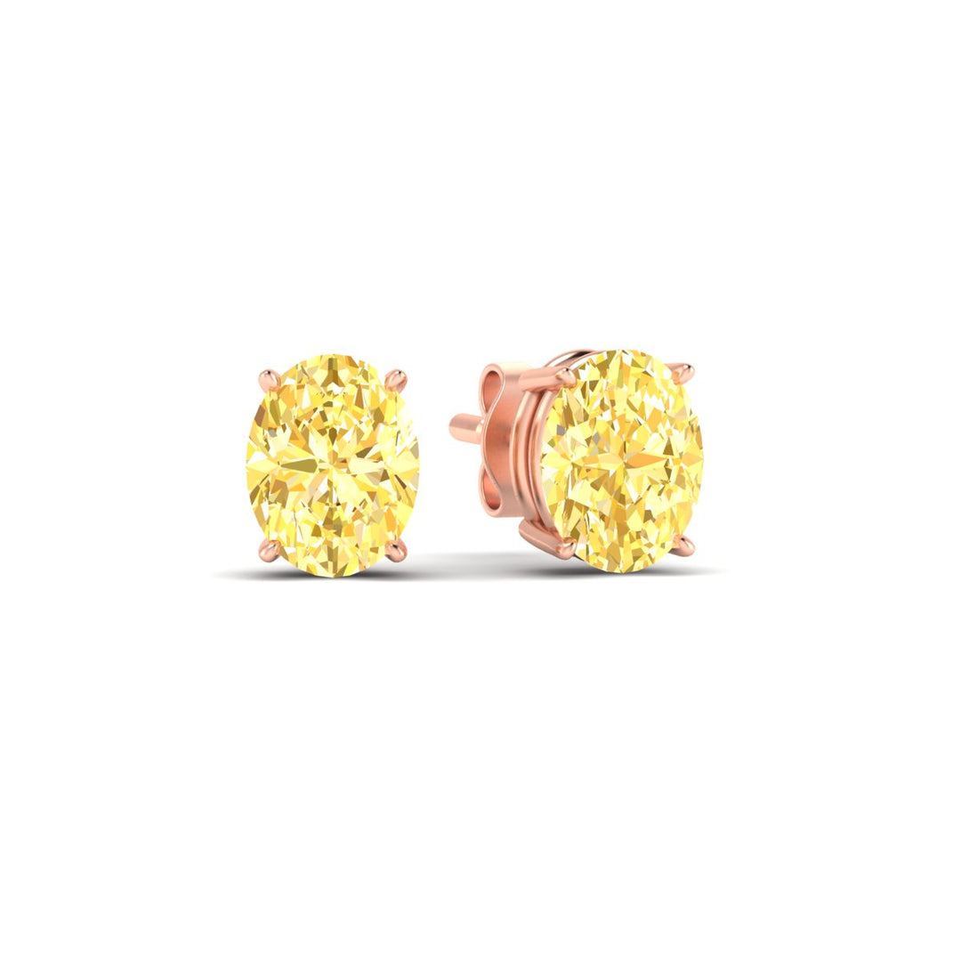 4-carat-oval-cut-vivid-yellow-diamond-stud-earrings-in-rose-gold-fdear10411ovgvyellowangle1-4.00ct-nl-rg.jpg