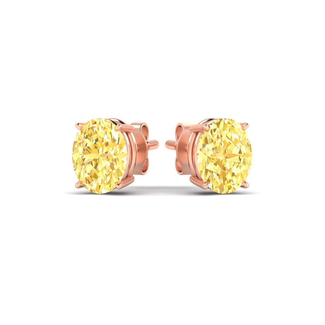4-carat-oval-cut-vivid-yellow-diamond-stud-earrings-in-rose-gold-fdear10411ovgvyellowangle3-4.00ct-nl-rg.jpg