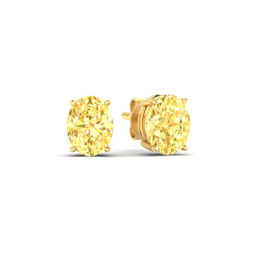 4-carat-oval-cut-vivid-yellow-diamond-stud-earrings-in-yellow-gold-fdear10411ovgvyellowangle1-4.00ct-nl-yg.jpg