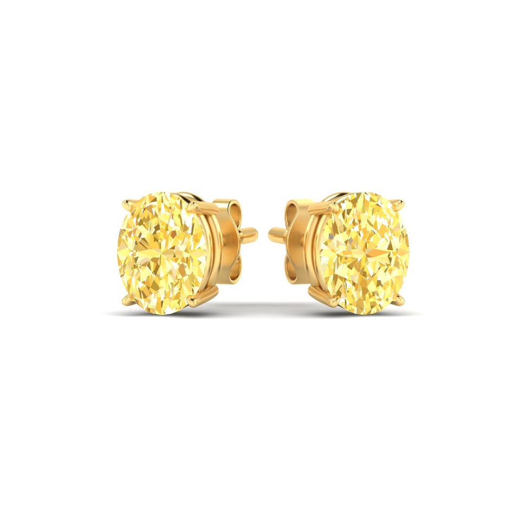 4-carat-oval-cut-vivid-yellow-diamond-stud-earrings-in-yellow-gold-fdear10411ovgvyellowangle3-4.00ct-nl-yg.jpg