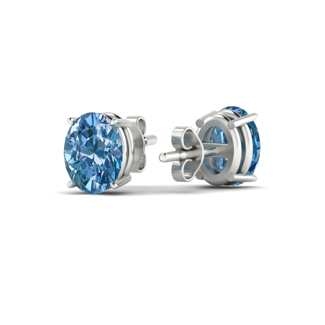 5-carat-oval-cut-vivid-blue-diamond-stud-earrings-in-white-gold-fdear10411ovgvblueangle4-5.00ct-nl-wg.jpg