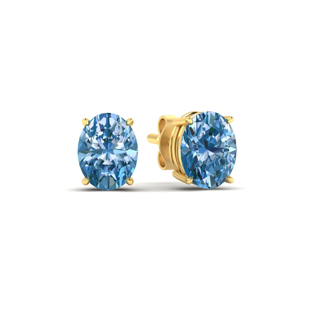 5-carat-oval-cut-vivid-blue-diamond-stud-earrings-in-yellow-gold-fdear10411ovgvblueangle1-5.00ct-nl-yg.jpg