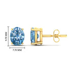 Load image into Gallery viewer, 5-carat-oval-cut-vivid-blue-diamond-stud-earrings-in-yellow-gold-fdear10411ovgvblueangle2-5.00ct-nl-yg-hw.jpg