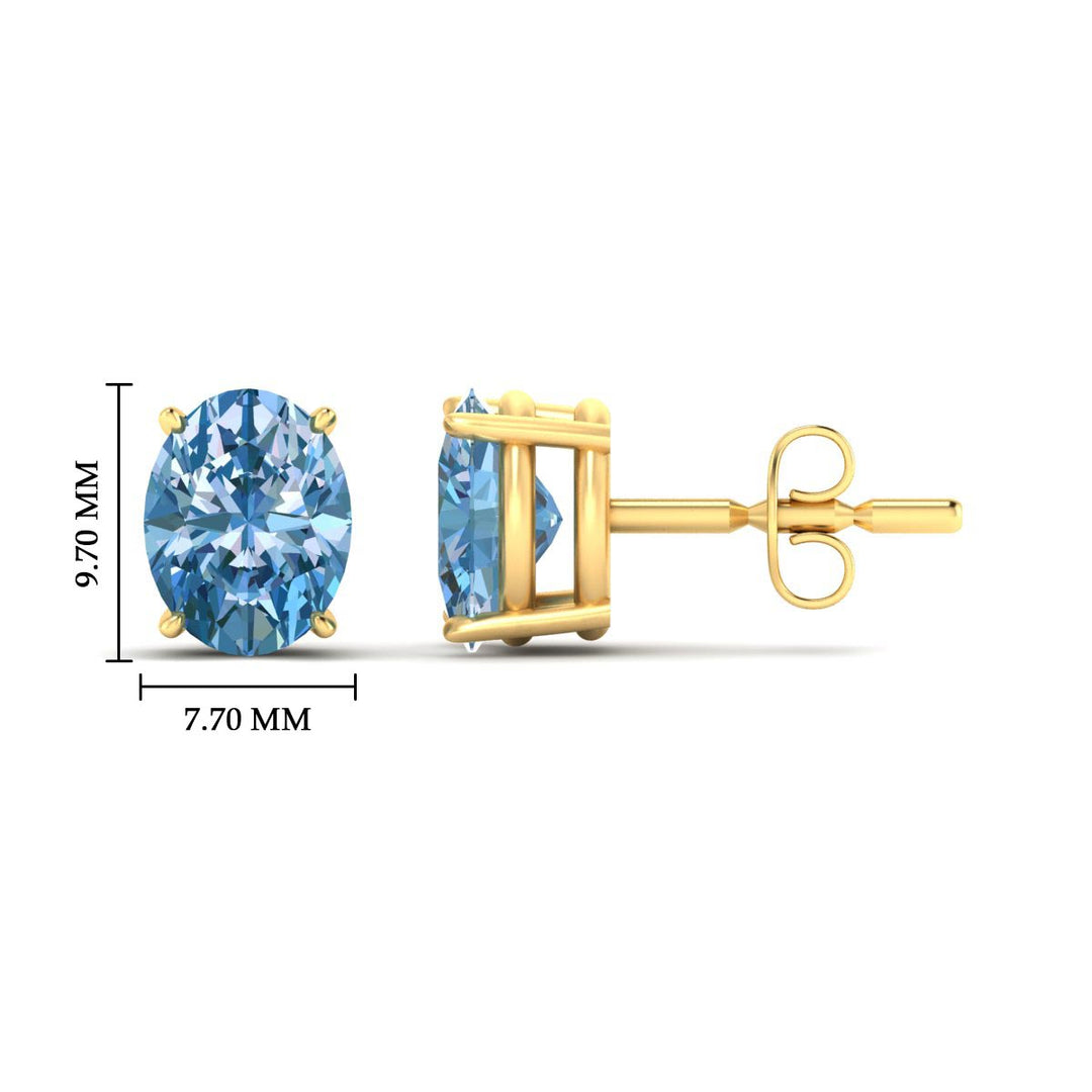5-carat-oval-cut-vivid-blue-diamond-stud-earrings-in-yellow-gold-fdear10411ovgvblueangle2-5.00ct-nl-yg-hw.jpg