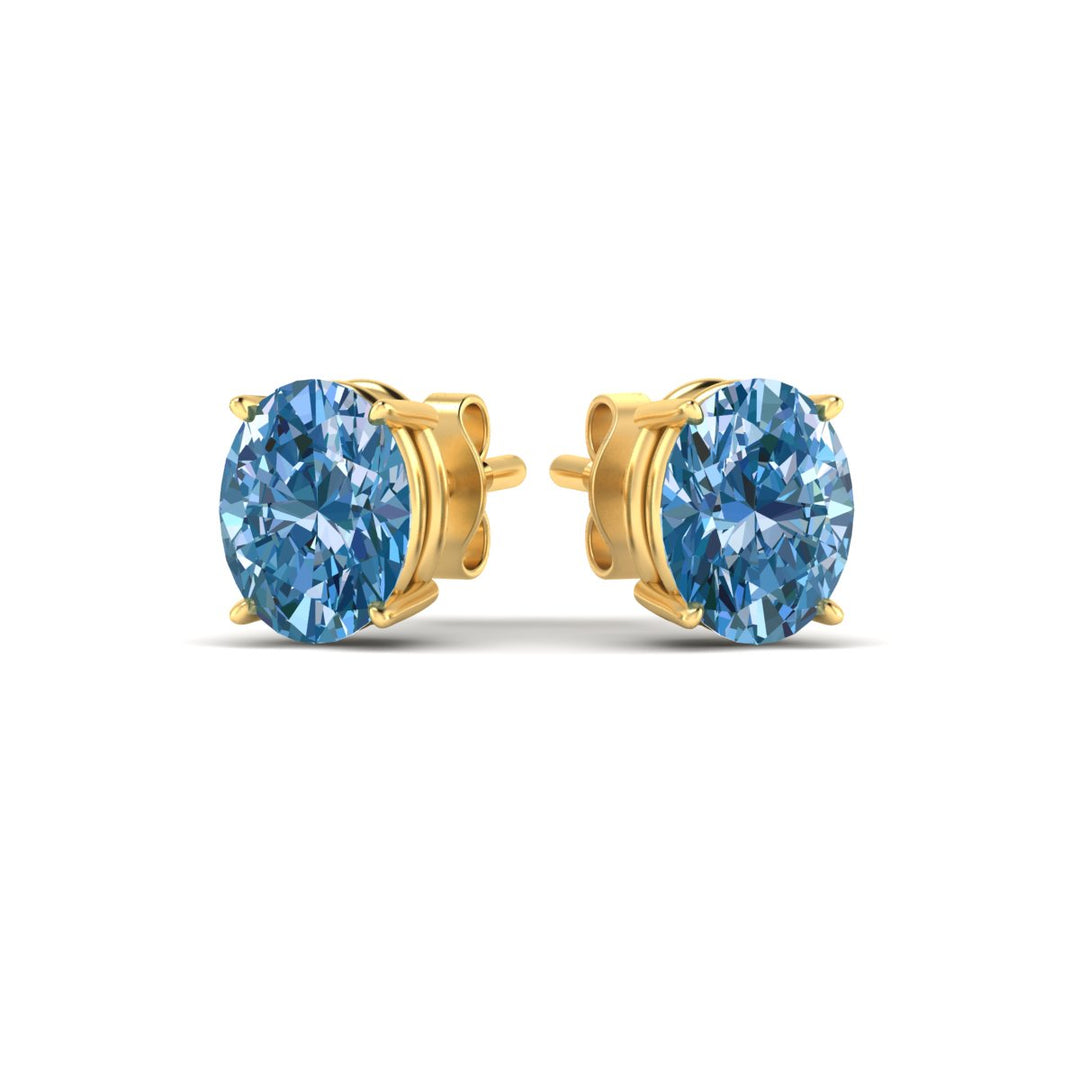 5-carat-oval-cut-vivid-blue-diamond-stud-earrings-in-yellow-gold-fdear10411ovgvblueangle3-5.00ct-nl-yg.jpg