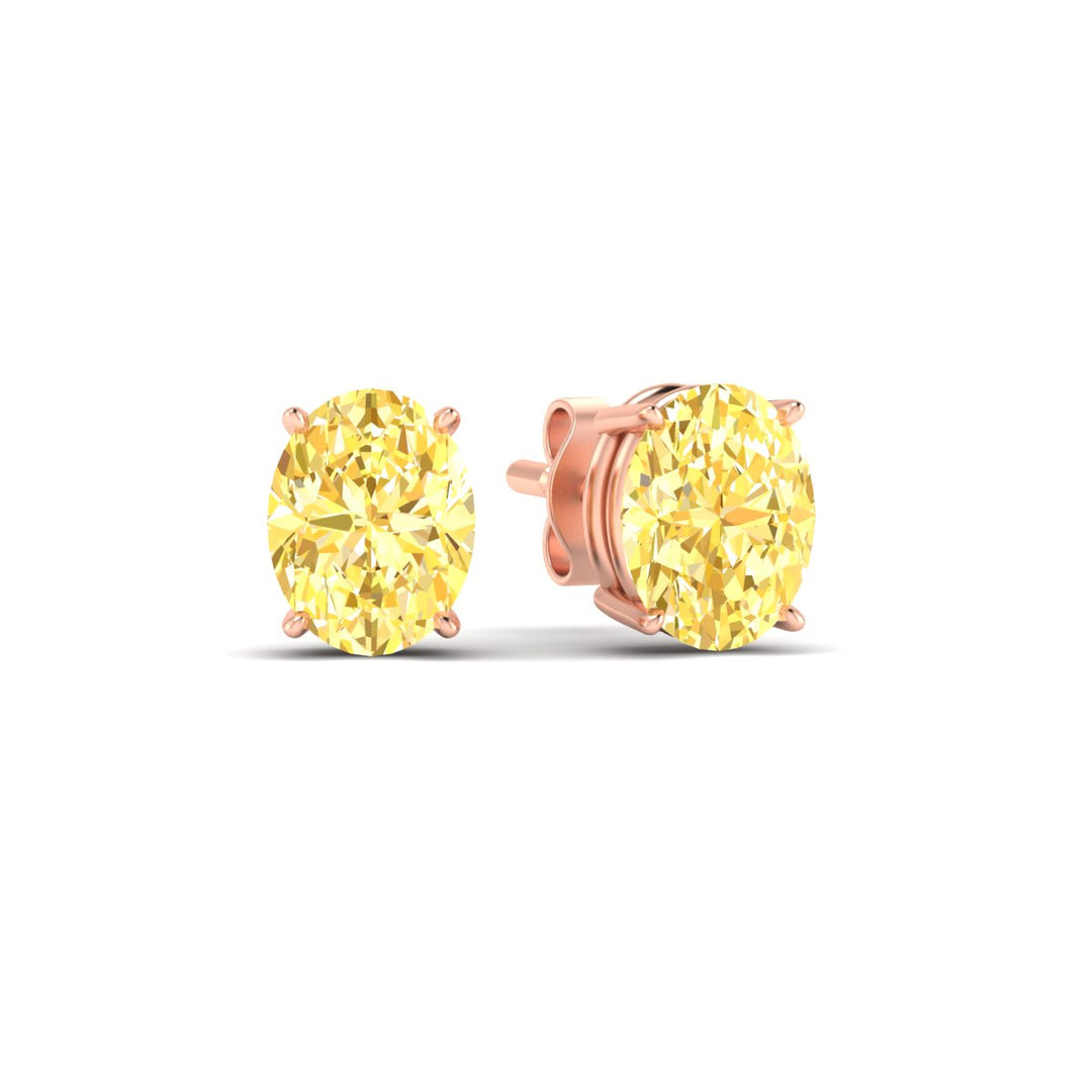 5-carat-oval-cut-vivid-yellow-diamond-stud-earrings-in-rose-gold-fdear10411ovgvyellowangle1-5.00ct-nl-rg.jpg