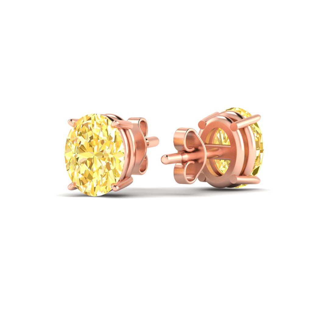 5-carat-oval-cut-vivid-yellow-diamond-stud-earrings-in-rose-gold-fdear10411ovgvyellowangle4-5.00ct-nl-rg.jpg