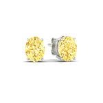 Load image into Gallery viewer, 5-carat-oval-cut-vivid-yellow-diamond-stud-earrings-in-white-gold-fdear10411ovgvyellowangle1-5.00ct-nl-wg.jpg