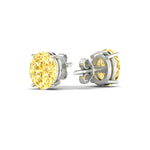Load image into Gallery viewer, 5-carat-oval-cut-vivid-yellow-diamond-stud-earrings-in-white-gold-fdear10411ovgvyellowangle4-5.00ct-nl-wg.jpg