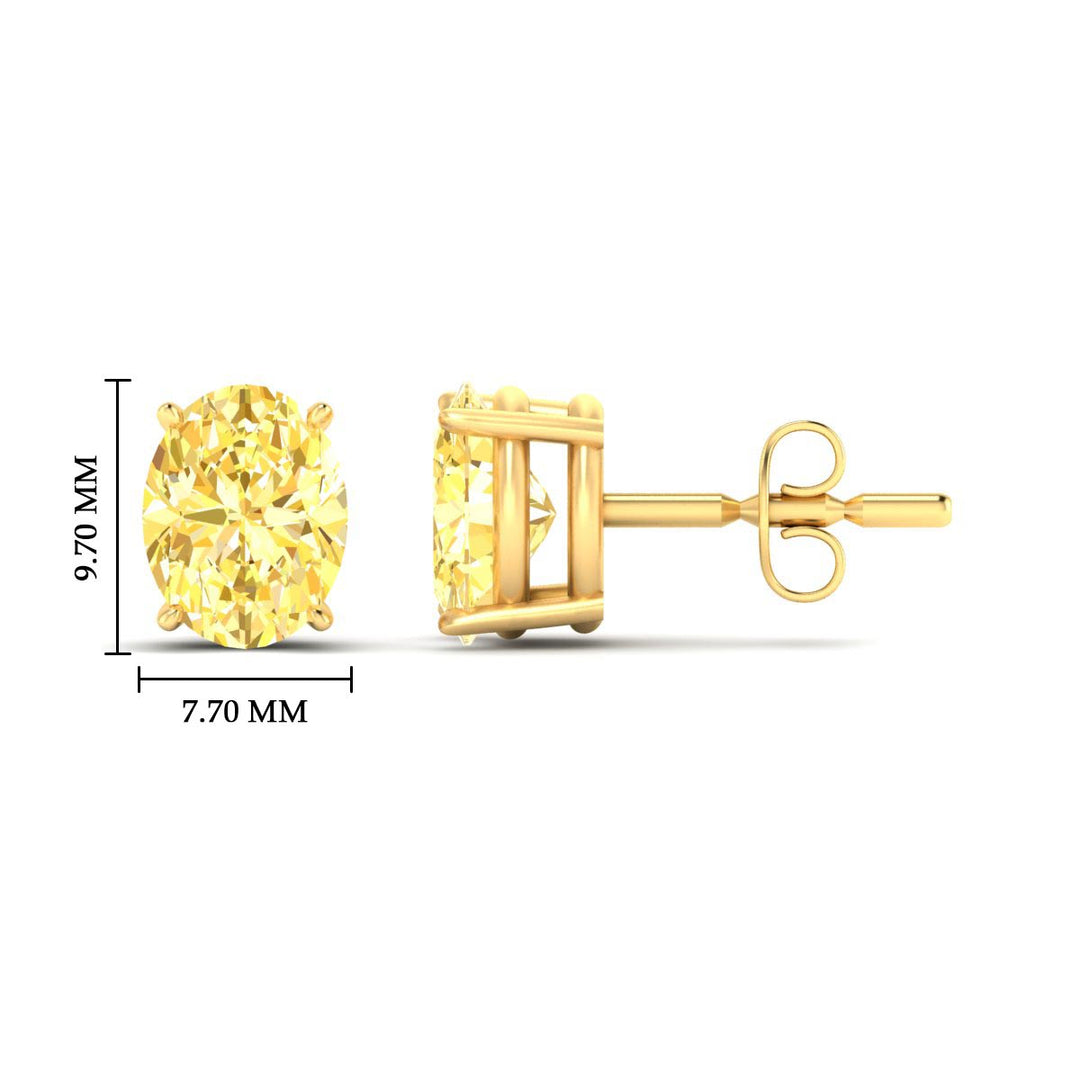 5-carat-oval-cut-vivid-yellow-diamond-stud-earrings-in-yellow-gold-fdear10411ovgvyellowangle2-5.00ct-nl-yg-hw.jpg