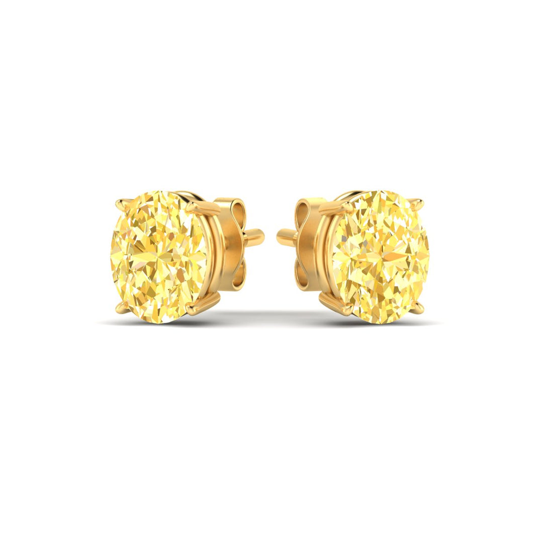 5-carat-oval-cut-vivid-yellow-diamond-stud-earrings-in-yellow-gold-fdear10411ovgvyellowangle3-5.00ct-nl-yg.jpg