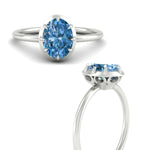 Load image into Gallery viewer, antique-style-oval-vivid-blue-bezel-solitaire-engagement-ring-in-white-gold-fdenr11614ovgvblueangle3-nl-wg.jpg