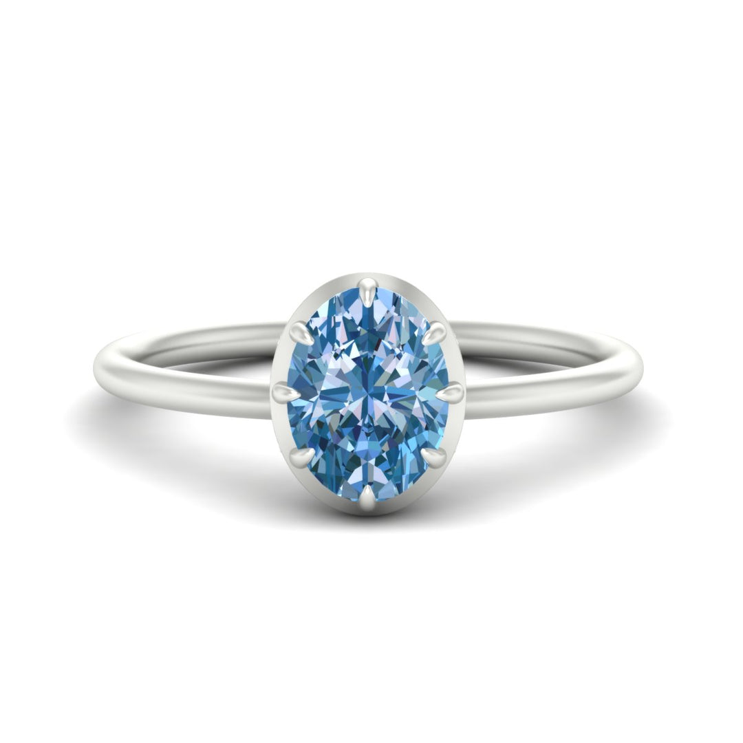 antique-style-oval-vivid-blue-bezel-solitaire-engagement-ring-in-white-gold-fdenr11614ovgvbluesleep-nl-wg.jpg