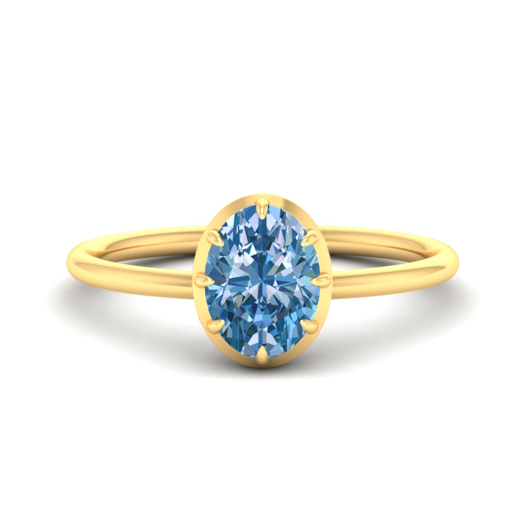 antique-style-oval-vivid-blue-bezel-solitaire-engagement-ring-in-yellow-gold-fdenr11614ovgvbluesleep-nl-yg.jpg