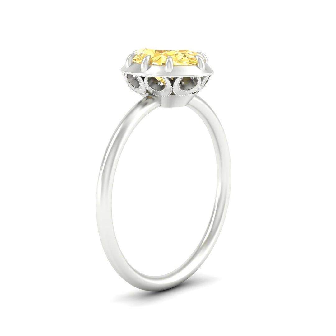 antique-style-oval-vivid-yellow-bezel-solitaire-engagement-ring-in-white-gold-fdenr11614ovgvyellowangle2-nl-wg.jpg