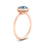 Load image into Gallery viewer, antique-style-round-vivid-blue-bezel-solitaire-engagement-ring-in-rose-gold-fdenr11614rogvblueangle2-nl-rg.jpg