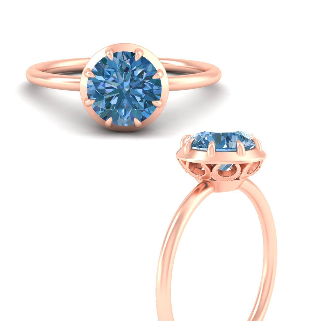 antique-style-round-vivid-blue-bezel-solitaire-engagement-ring-in-rose-gold-fdenr11614rogvblueangle3-nl-rg.jpg