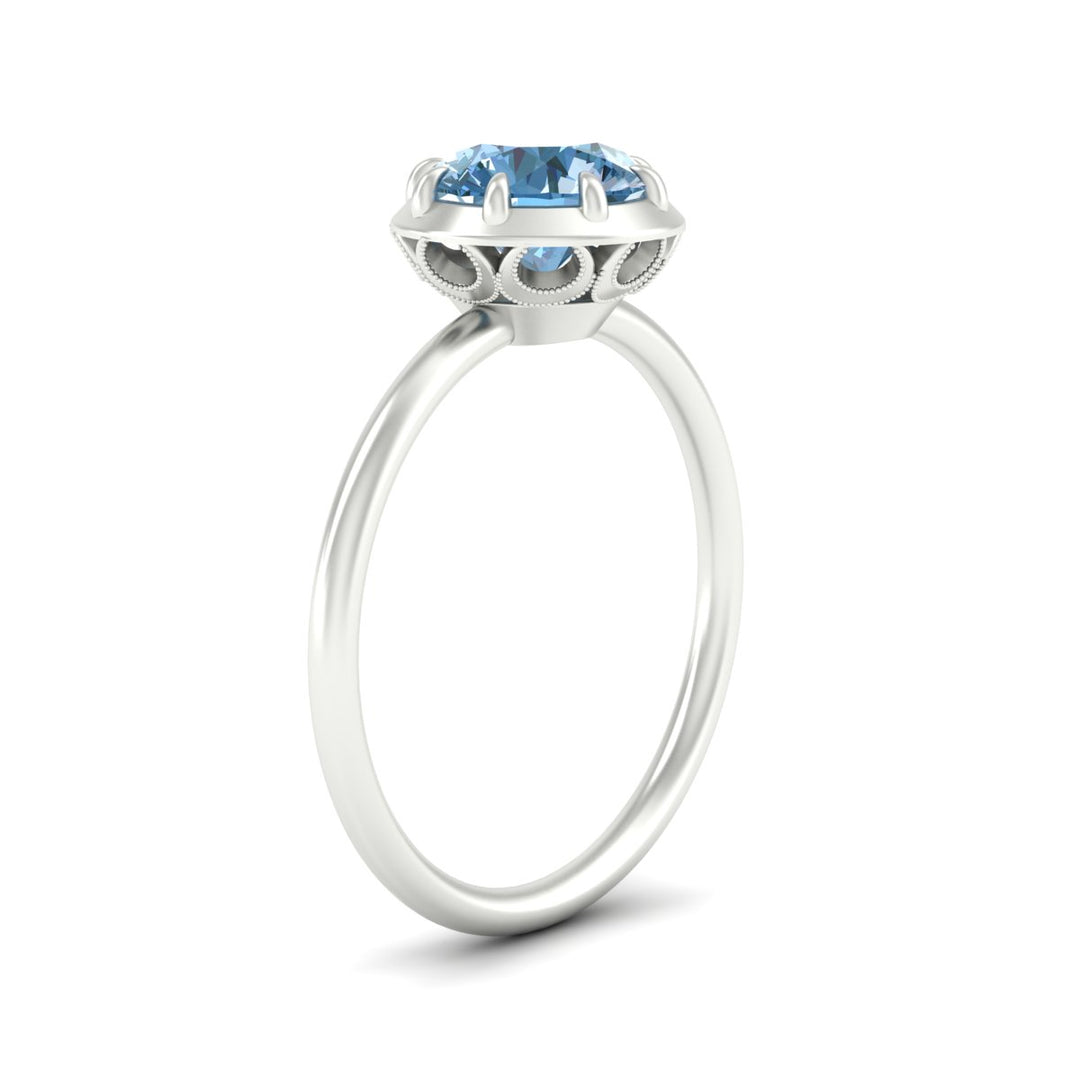 antique-style-round-vivid-blue-bezel-solitaire-engagement-ring-in-white-gold-fdenr11614rogvblueangle2-nl-wg.jpg