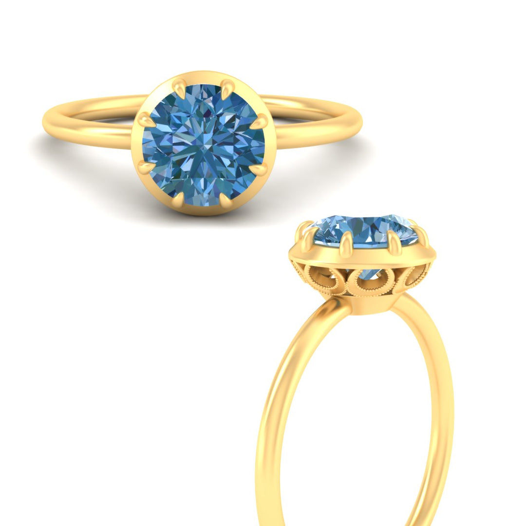 antique-style-round-vivid-blue-bezel-solitaire-engagement-ring-in-yellow-gold-fdenr11614rogvblueangle3-nl-yg.jpg