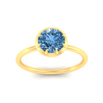 Load image into Gallery viewer, antique-style-round-vivid-blue-bezel-solitaire-engagement-ring-in-yellow-gold-fdenr11614rogvblueangle5-nl-yg.jpg