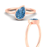 Load image into Gallery viewer, bezel-lab-fancy-color-pear-shaped-solitaire-vivid-blue-ring-in-rose-gold-fdenr11596gvblueangle3-nl-rg.jpg
