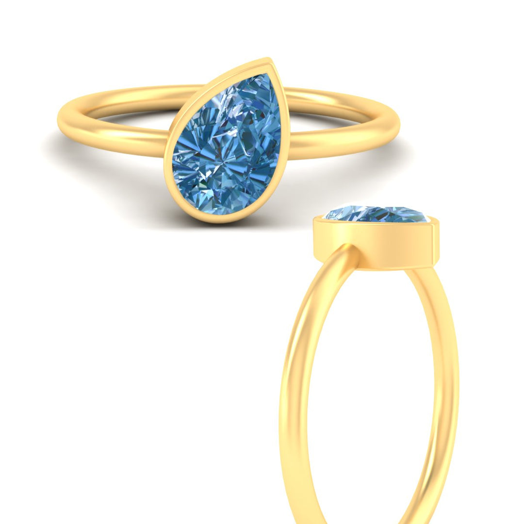 bezel-lab-fancy-color-pear-shaped-solitaire-vivid-blue-ring-in-yellow-gold-fdenr11596gvblueangle3-nl-yg.jpg