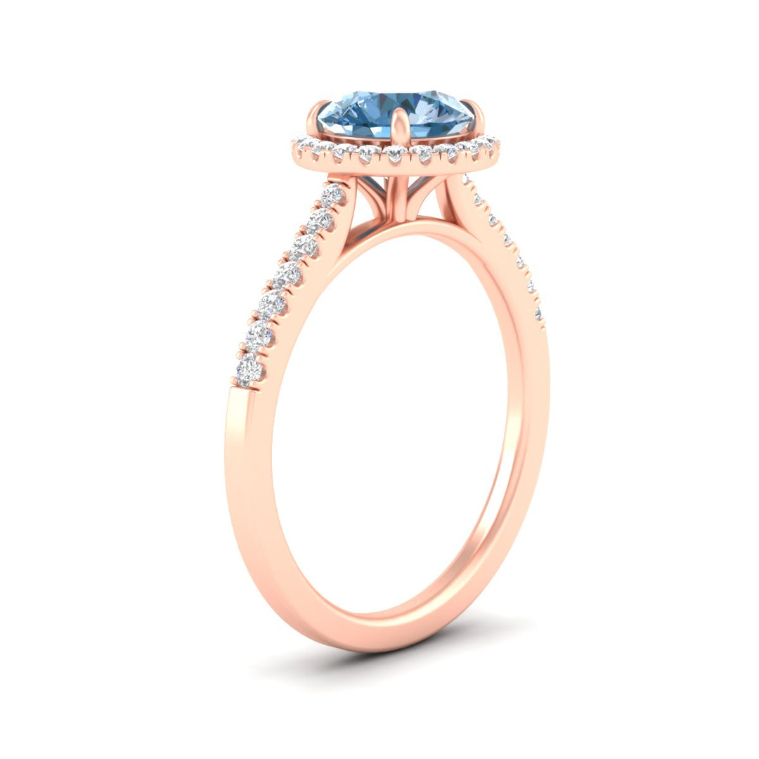 cathedral-pave-halo-round-vivid-blue-engagement-ring-in-rose-gold-fdenr11704rogvblueangle2-nl-rg.jpg