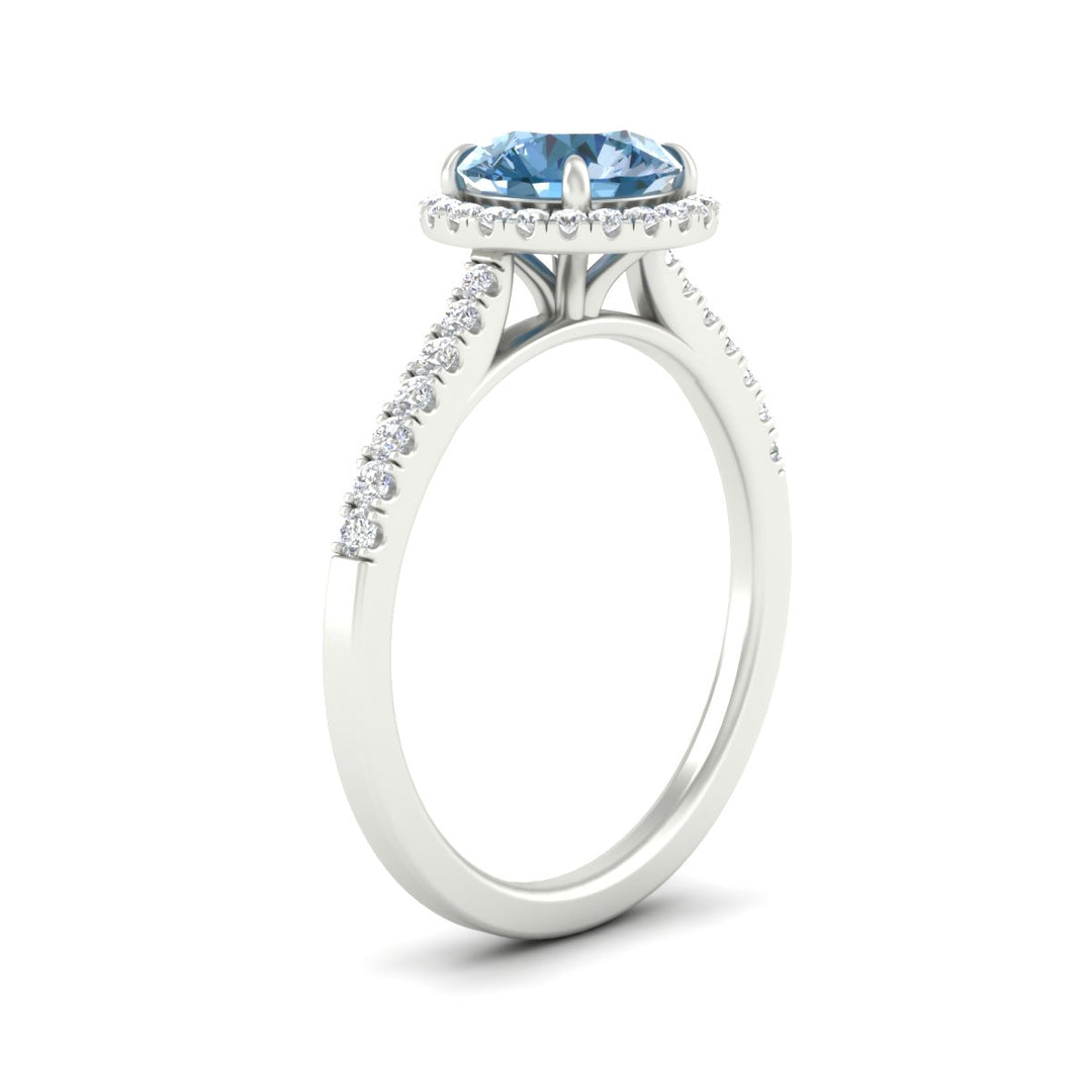 cathedral-pave-halo-round-vivid-blue-engagement-ring-in-white-gold-fdenr11704rogvblueangle2-nl-wg.jpg
