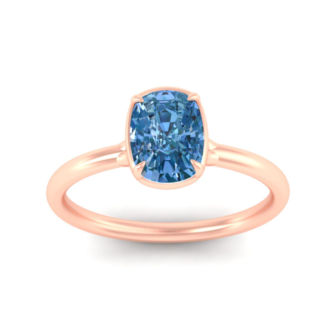 cushion-cut-collet-set-solitaire-vivid-blue-engagement-ring-in-rose-gold-fdenr11593cugvblueangle5-nl-rg.jpg