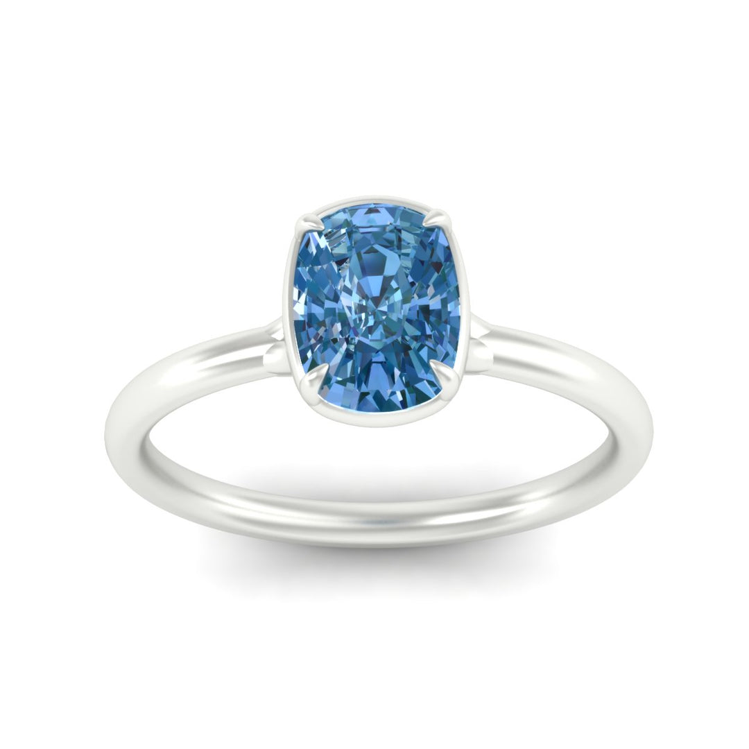 cushion-cut-collet-set-solitaire-vivid-blue-engagement-ring-in-white-gold-fdenr11593cugvblueangle5-nl-wg.jpg
