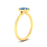 Load image into Gallery viewer, cushion-cut-collet-set-solitaire-vivid-blue-engagement-ring-in-yellow-gold-fdenr11593cugvblueangle2-nl-yg.jpg