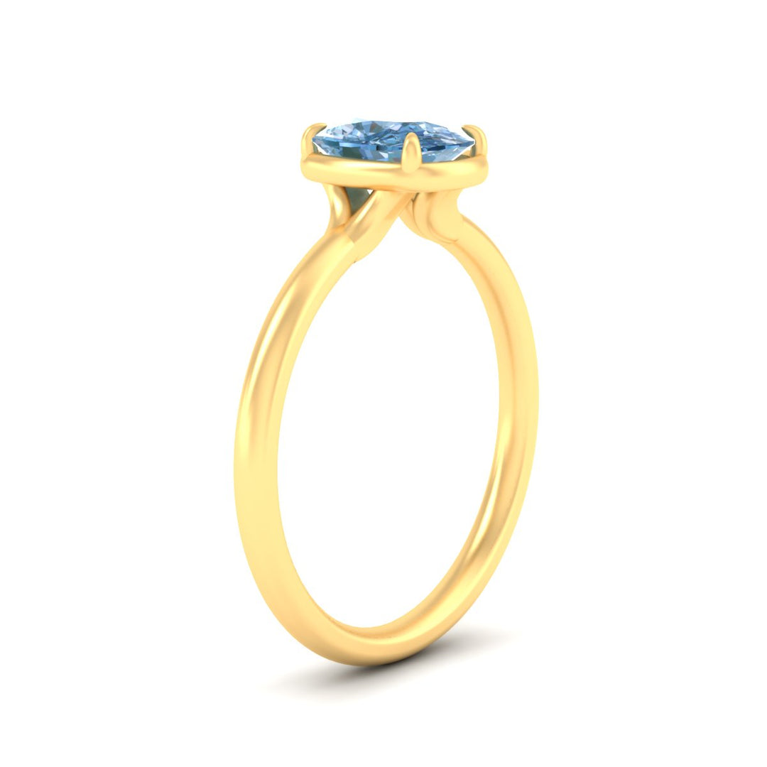 cushion-cut-collet-set-solitaire-vivid-blue-engagement-ring-in-yellow-gold-fdenr11593cugvblueangle2-nl-yg.jpg