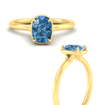 Load image into Gallery viewer, cushion-cut-collet-set-solitaire-vivid-blue-engagement-ring-in-yellow-gold-fdenr11593cugvblueangle3-nl-yg.jpg