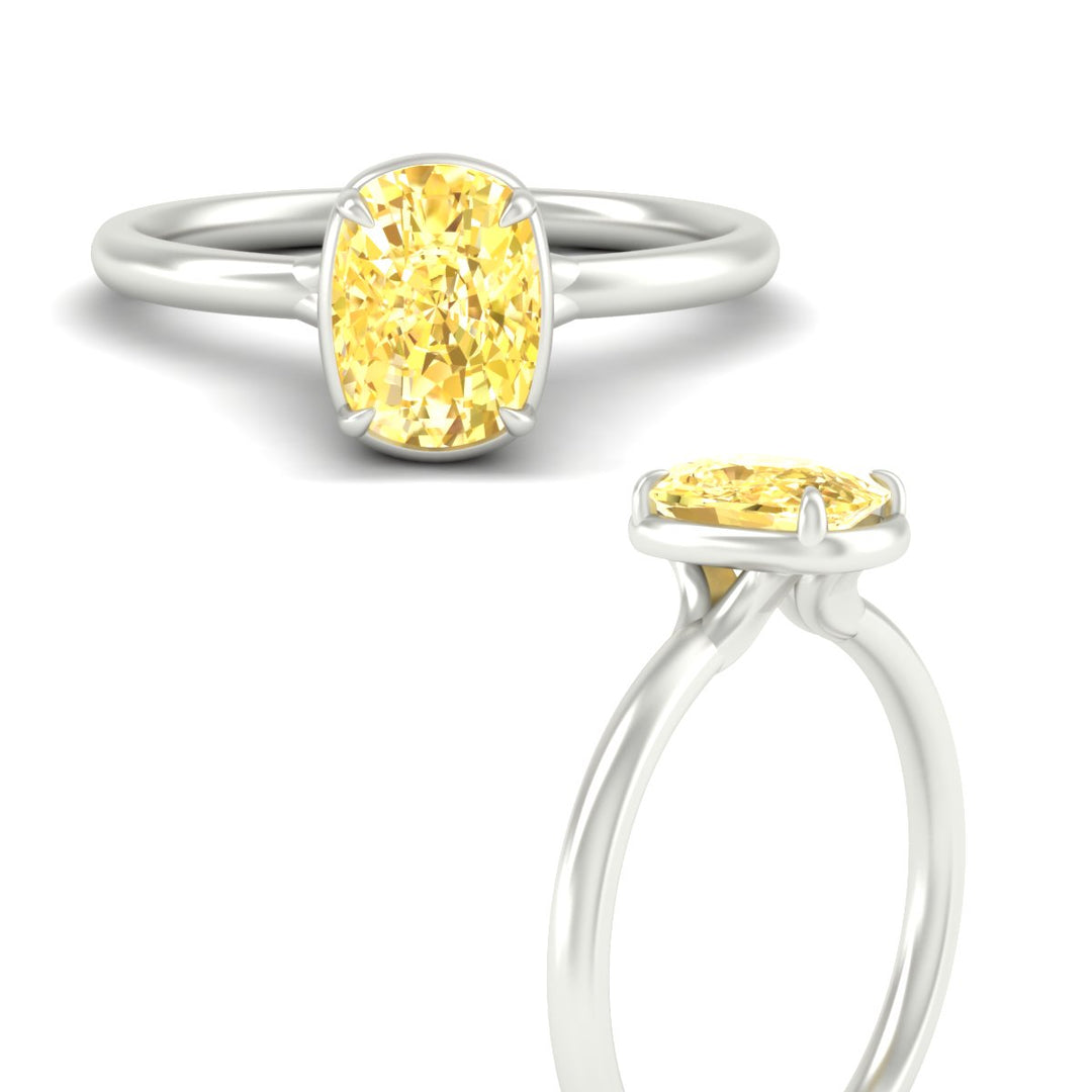 cushion-cut-collet-set-solitaire-vivid-yellow-engagement-ring-in-white-gold-fdenr11593cugvyellowangle3-nl-wg.jpg