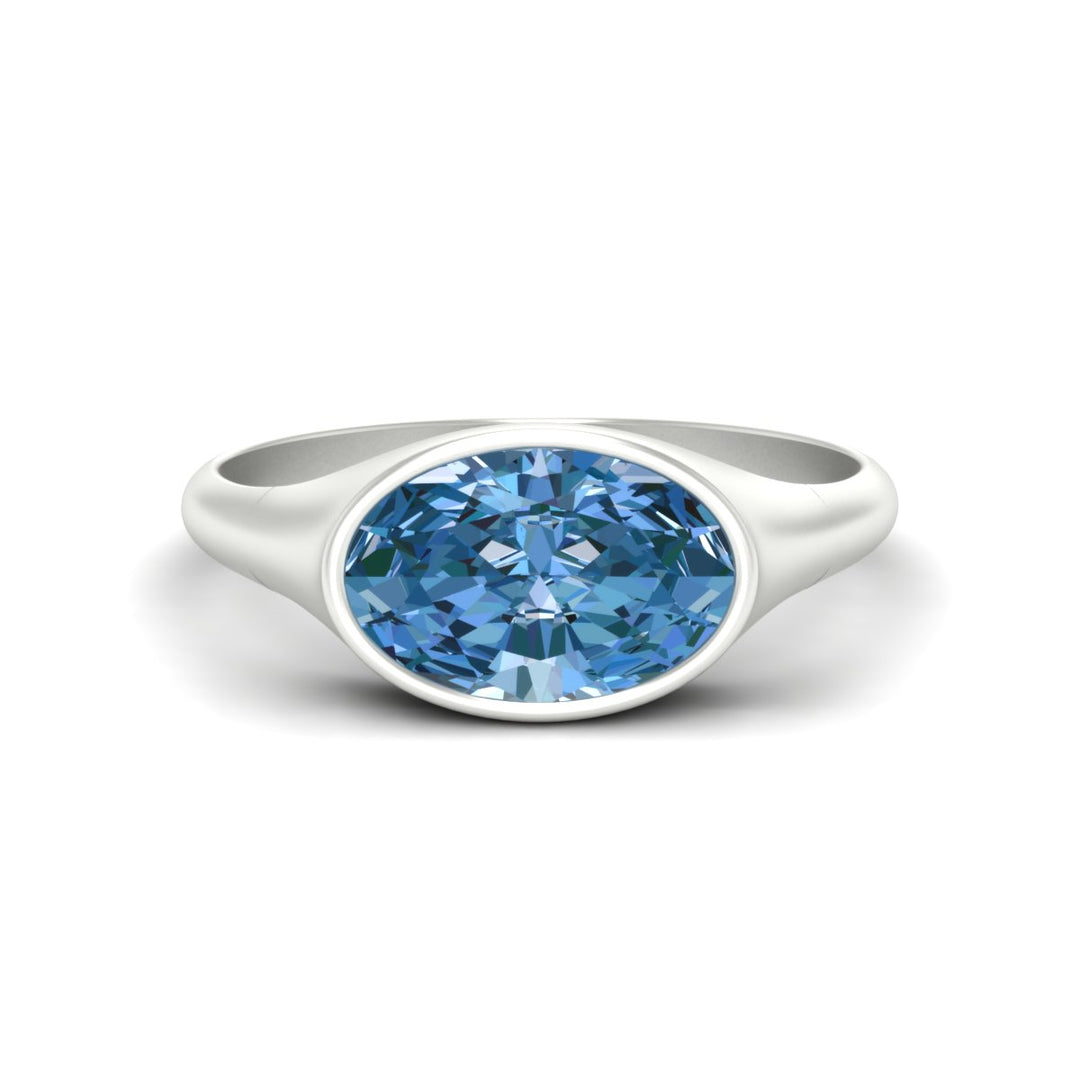 east-west-oval-bezel-vivid-blue-engagement-ring-in-white-gold-fdenr11606gvgluesleep-nl-wg.jpg?v=1789038624