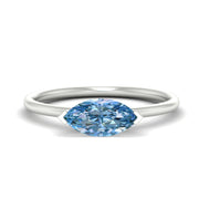 east-west-vivid-blue-marquise-cut-solitaire-engagement-ring-in-white-gold-fdenr11731gvbluesleep-nl-wg.jpg