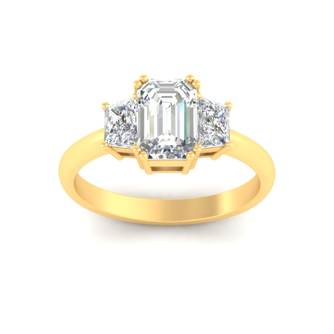 emerald-cut-diamond-trapezoid-engagement-ring-in-yellow-gold-fdenr7981emangle5-nl-yg.jpg?v=1788347229