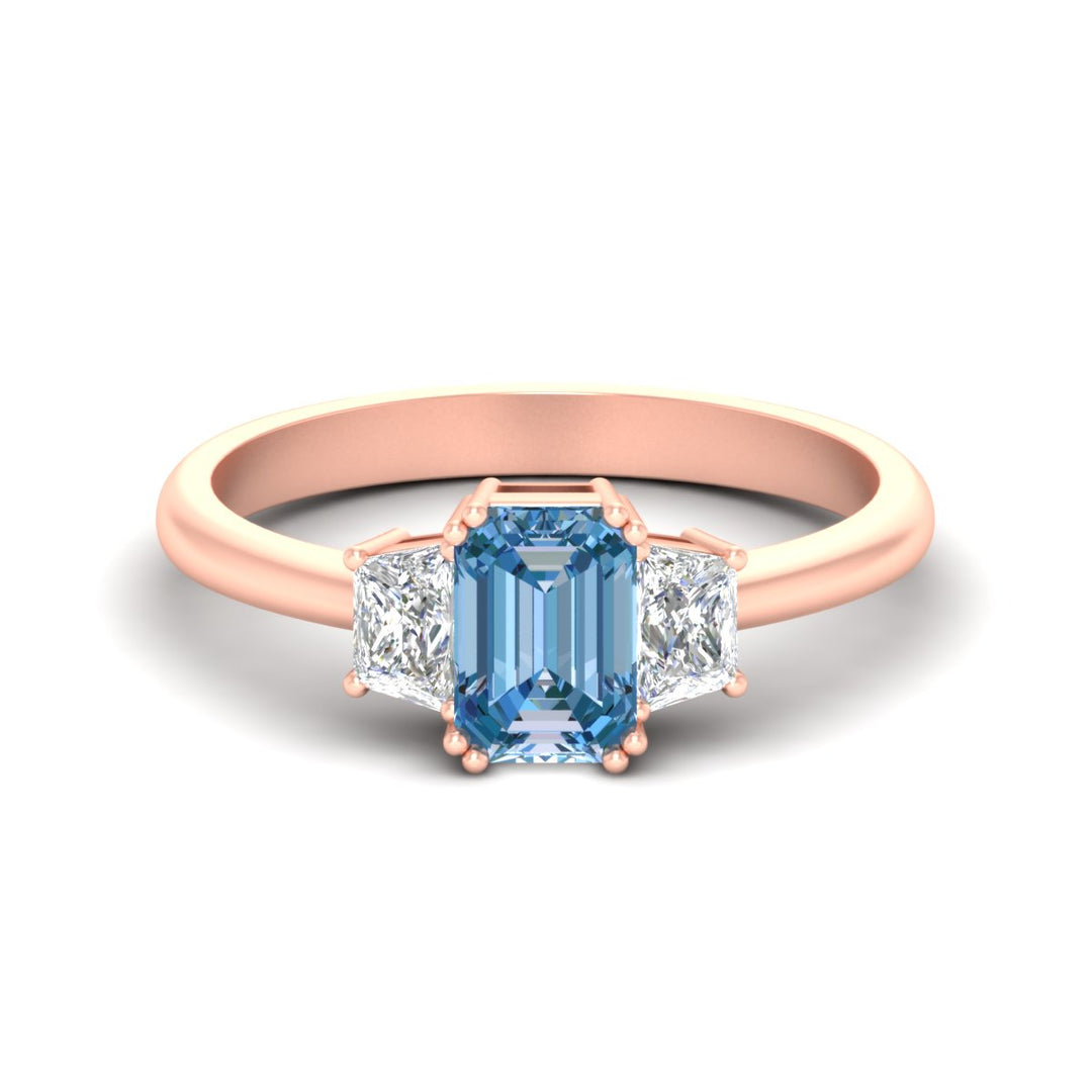 emerald-cut-vivid-blue-trapezoid-engagement-ring-in-rose-gold-fdenr7981emgvbluesleep-nl-rg.jpg?v=1788347229