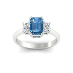 Load image into Gallery viewer, emerald-cut-vivid-blue-trapezoid-engagement-ring-in-white-gold-fdenr7981emgvblueangle5-nl-wg.jpg?v=1788347229