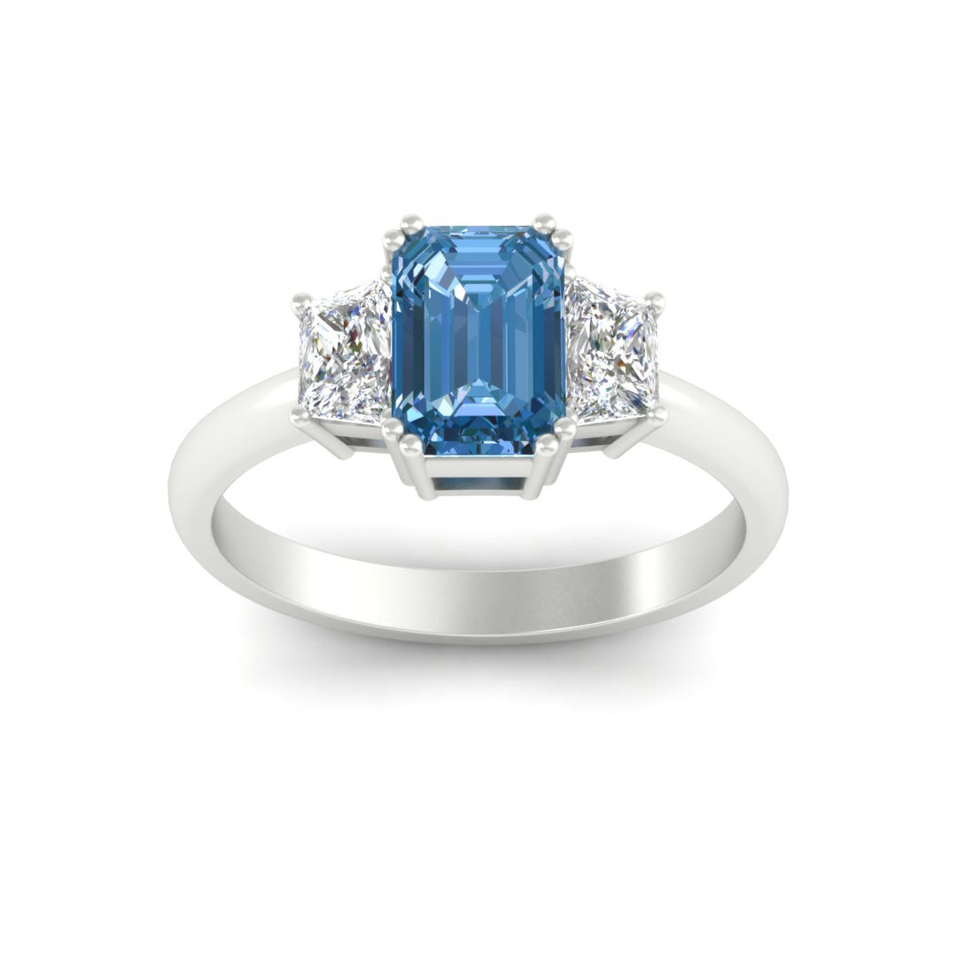emerald-cut-vivid-blue-trapezoid-engagement-ring-in-white-gold-fdenr7981emgvblueangle5-nl-wg.jpg?v=1788347229