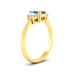 Load image into Gallery viewer, emerald-cut-vivid-blue-trapezoid-engagement-ring-in-yellow-gold-fdenr7981emgvblueangle2-nl-yg.jpg?v=1788347229