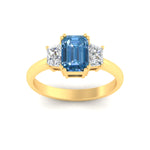 Load image into Gallery viewer, emerald-cut-vivid-blue-trapezoid-engagement-ring-in-yellow-gold-fdenr7981emgvblueangle5-nl-yg.jpg?v=1788347229