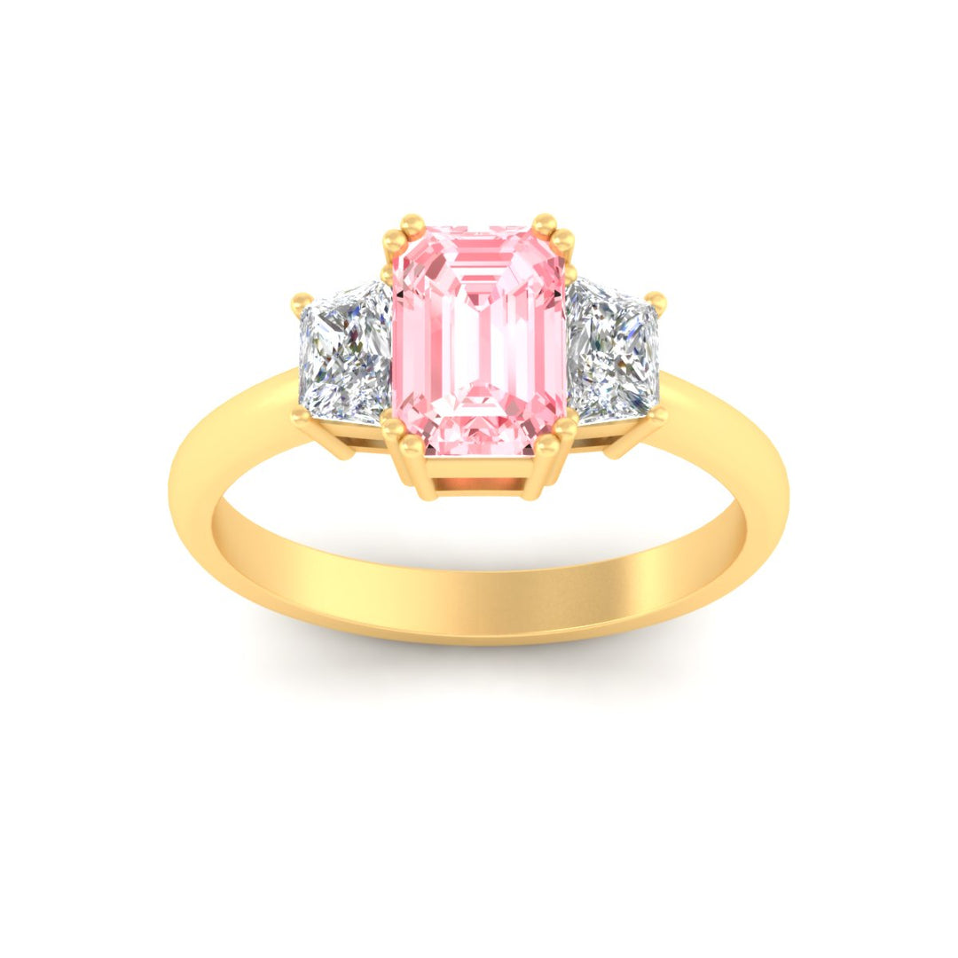 emerald-cut-vivid-pink-trapezoid-engagement-ring-in-yellow-gold-fdenr7981emgvpinkangle5-nl-yg.jpg?v=1788347229
