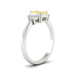 Load image into Gallery viewer, emerald-cut-vivid-yellow-trapezoid-engagement-ring-in-white-gold-fdenr7981emgvyellowangle2-nl-wg.jpg?v=1788347229