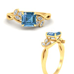 Load image into Gallery viewer, floral-leaf-asscher-cut-vivid-blue-engagement-ring-in-yellow-gold-fdenr10962asgvblueangle3-nl-yg.jpg