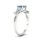Load image into Gallery viewer, floral-leaf-cushion-cut-vivid-blue-engagement-ring-in-white-gold-fdenr10962cugvblueangle2-nl-wg.jpg