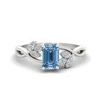Load image into Gallery viewer, floral-leaf-emerald-cut-vivid-blue-engagement-ring-in-white-gold-fdenr10962emgvbluesleep-nl-wg.jpg