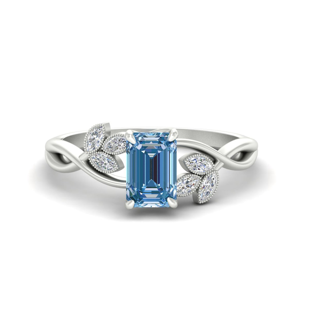 floral-leaf-emerald-cut-vivid-blue-engagement-ring-in-white-gold-fdenr10962emgvbluesleep-nl-wg.jpg