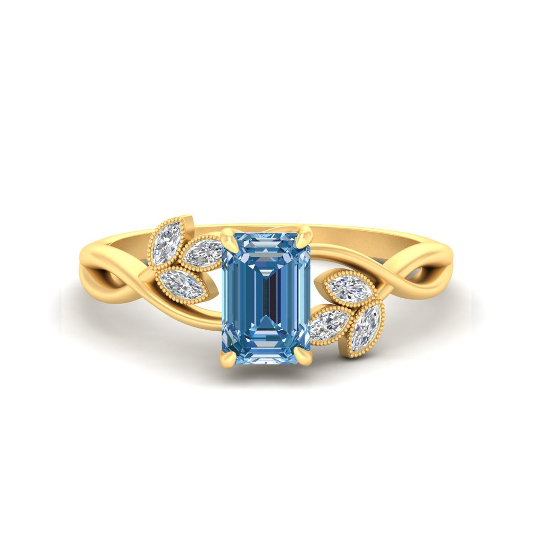 floral-leaf-emerald-cut-vivid-blue-engagement-ring-in-yellow-gold-fdenr10962emgvbluesleep-nl-yg.jpg